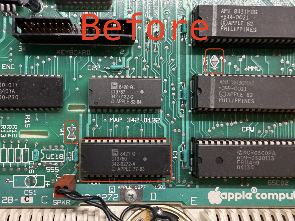 a closeup of an Apple //c motherboard. "Before" appears in large red text at the top of the image. a chip is outlined in red as well as W1 and W2
