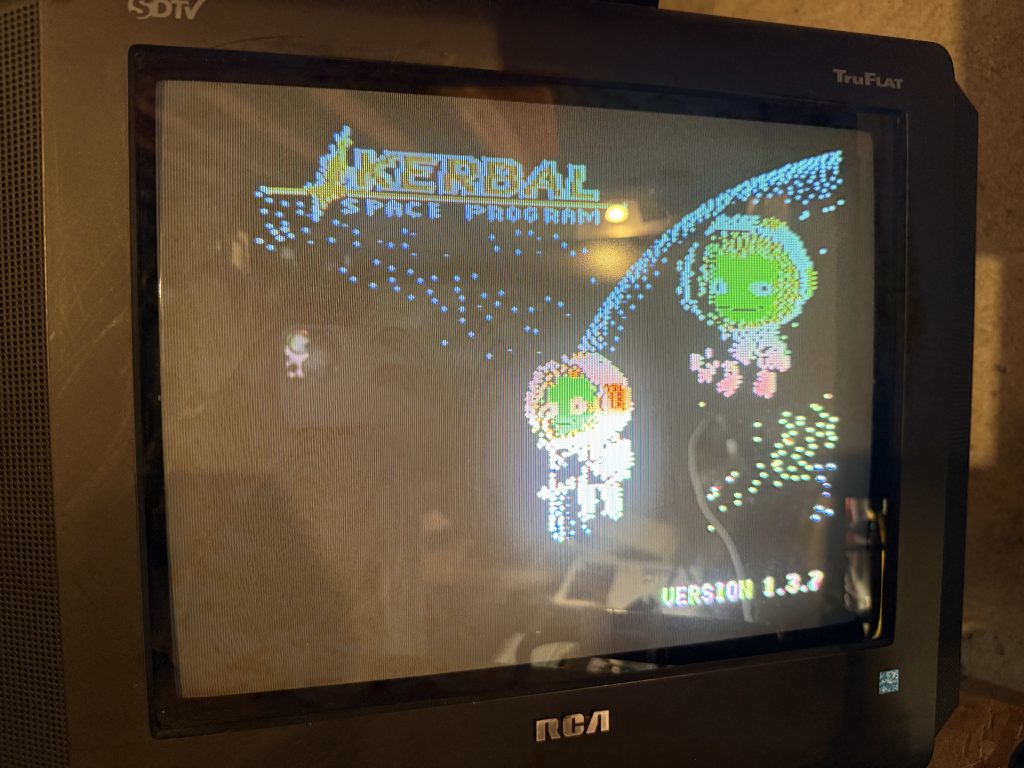A CRT screen showing an Apple II version of Kerbal space program