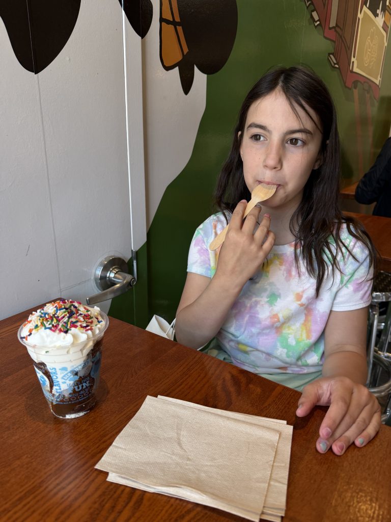 a girl eating ice cream
