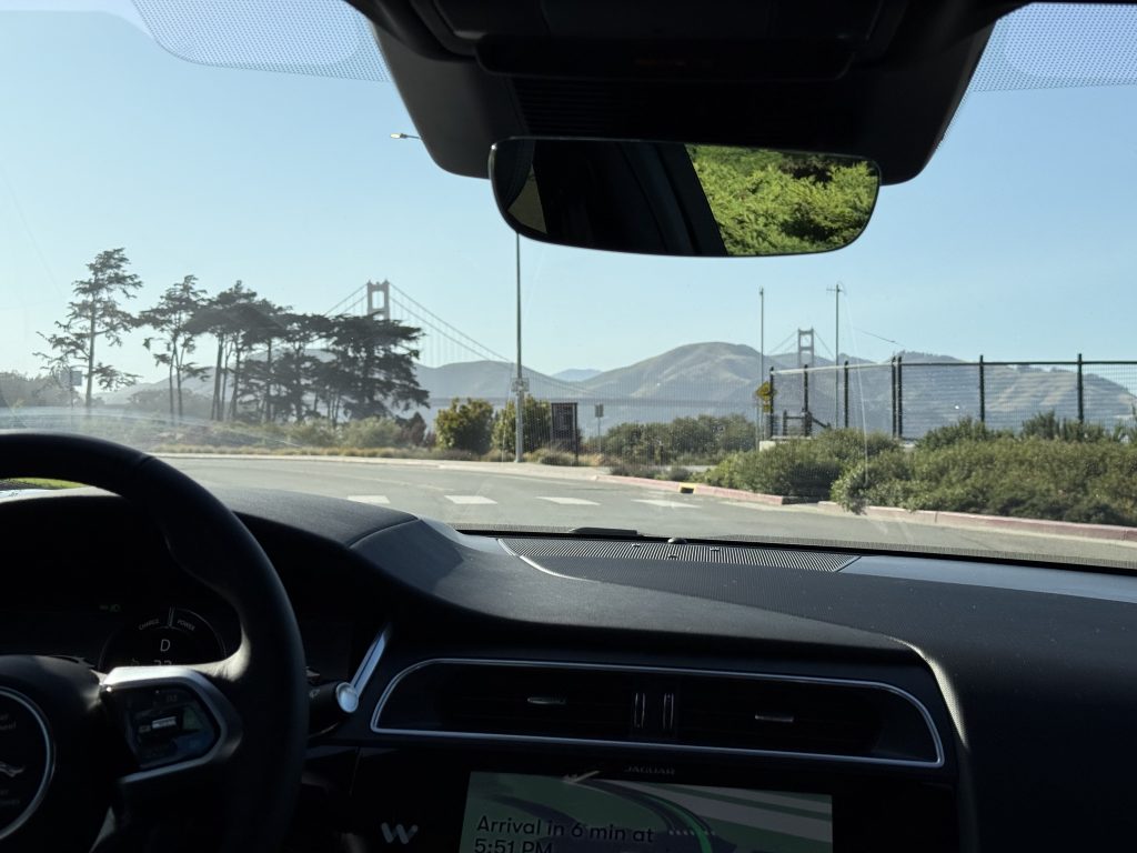 view from inside a self-driving car going past the golden gate bridge