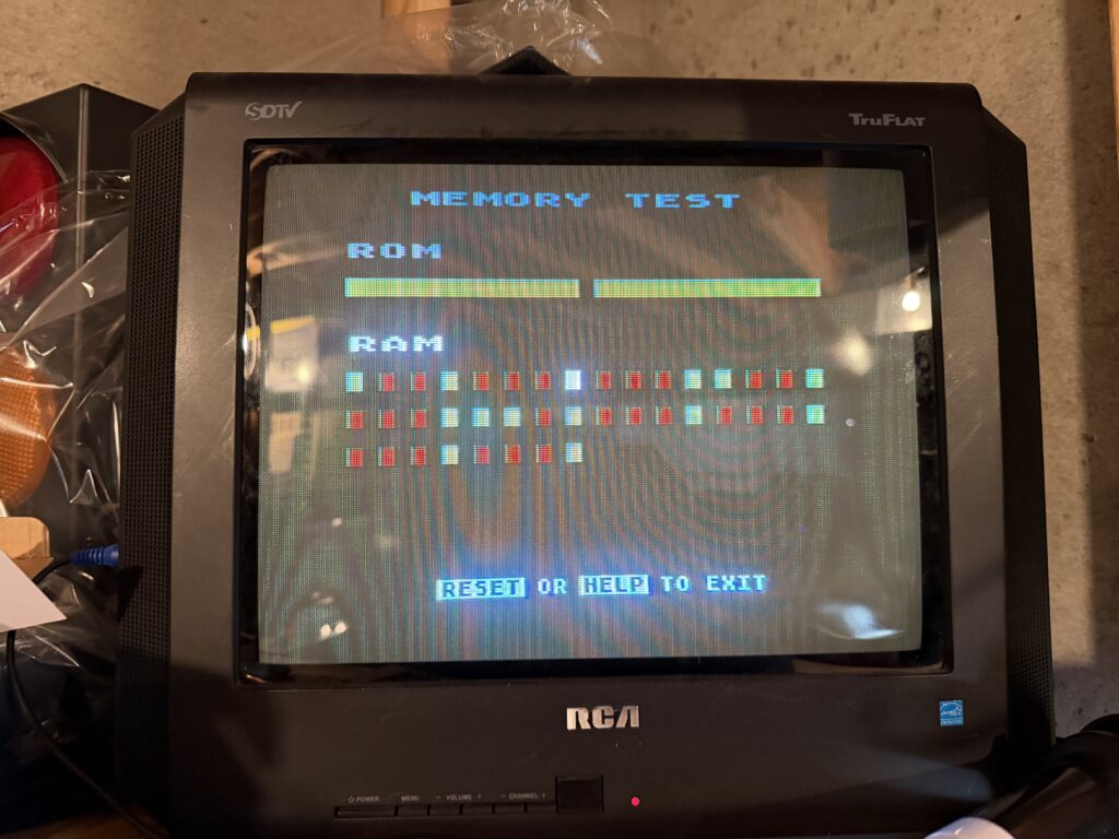 a television shows "MEMORY TEST ROM RAM". under ROM is two green bars. under RAM is several green and red dots
